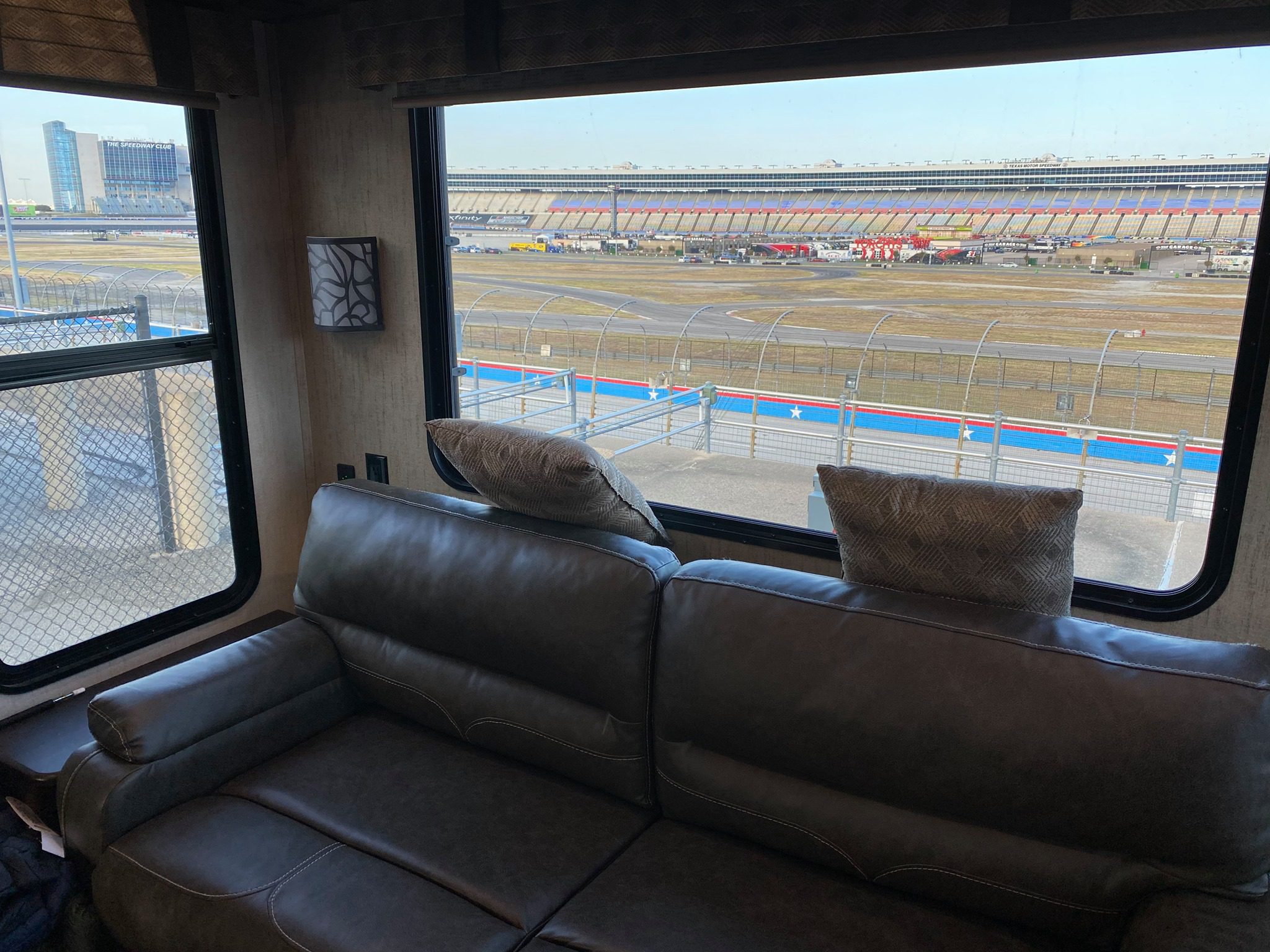 Nascar Sponsorship package camper window looking out from the middle of track